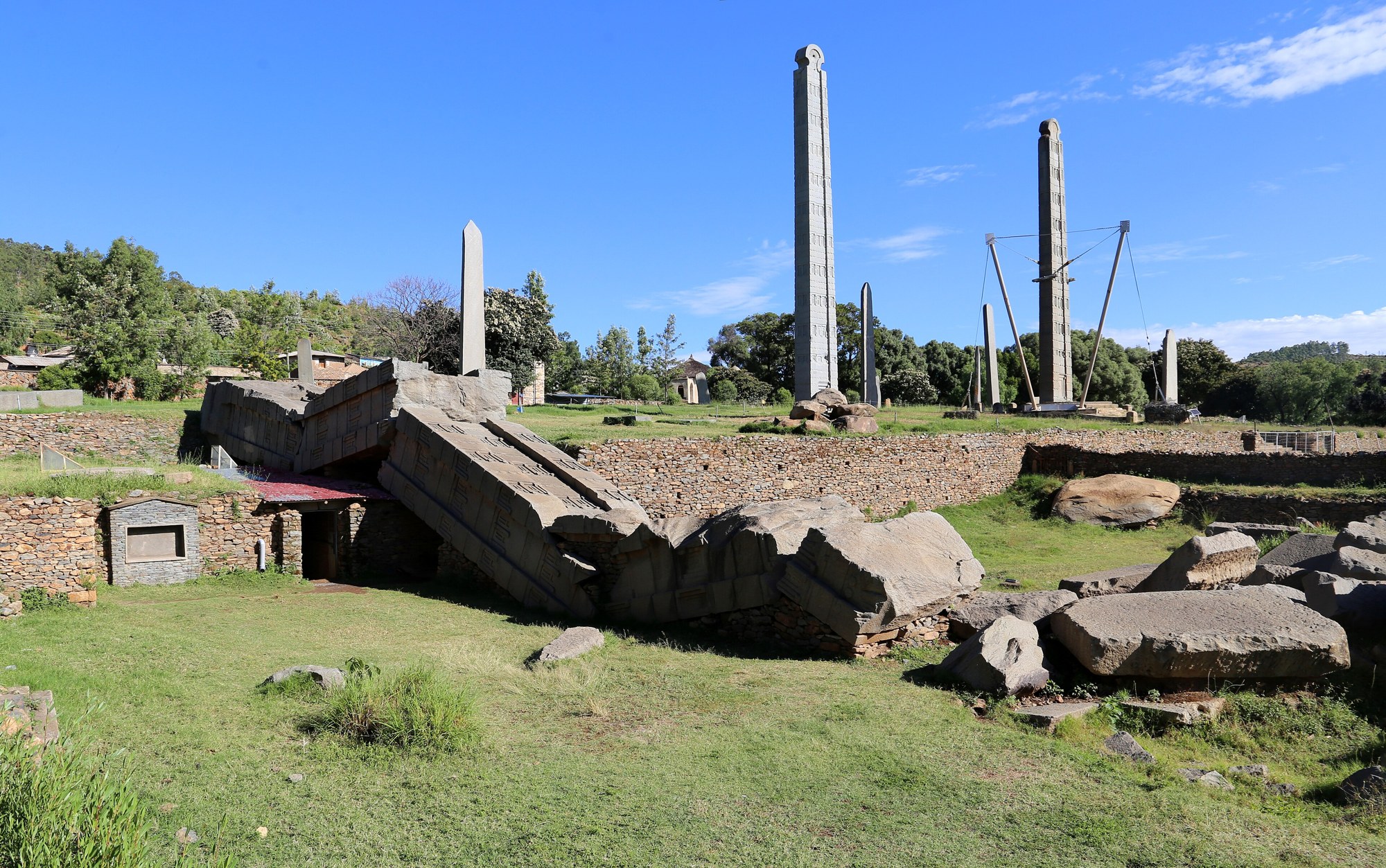 The broken sections of the Great Stele of Aksum lying on the ground
